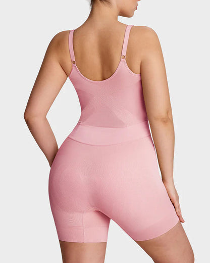 Naadloze shapewear body met dunne verstelbare bandjes en pijpen tot halverwege de dij