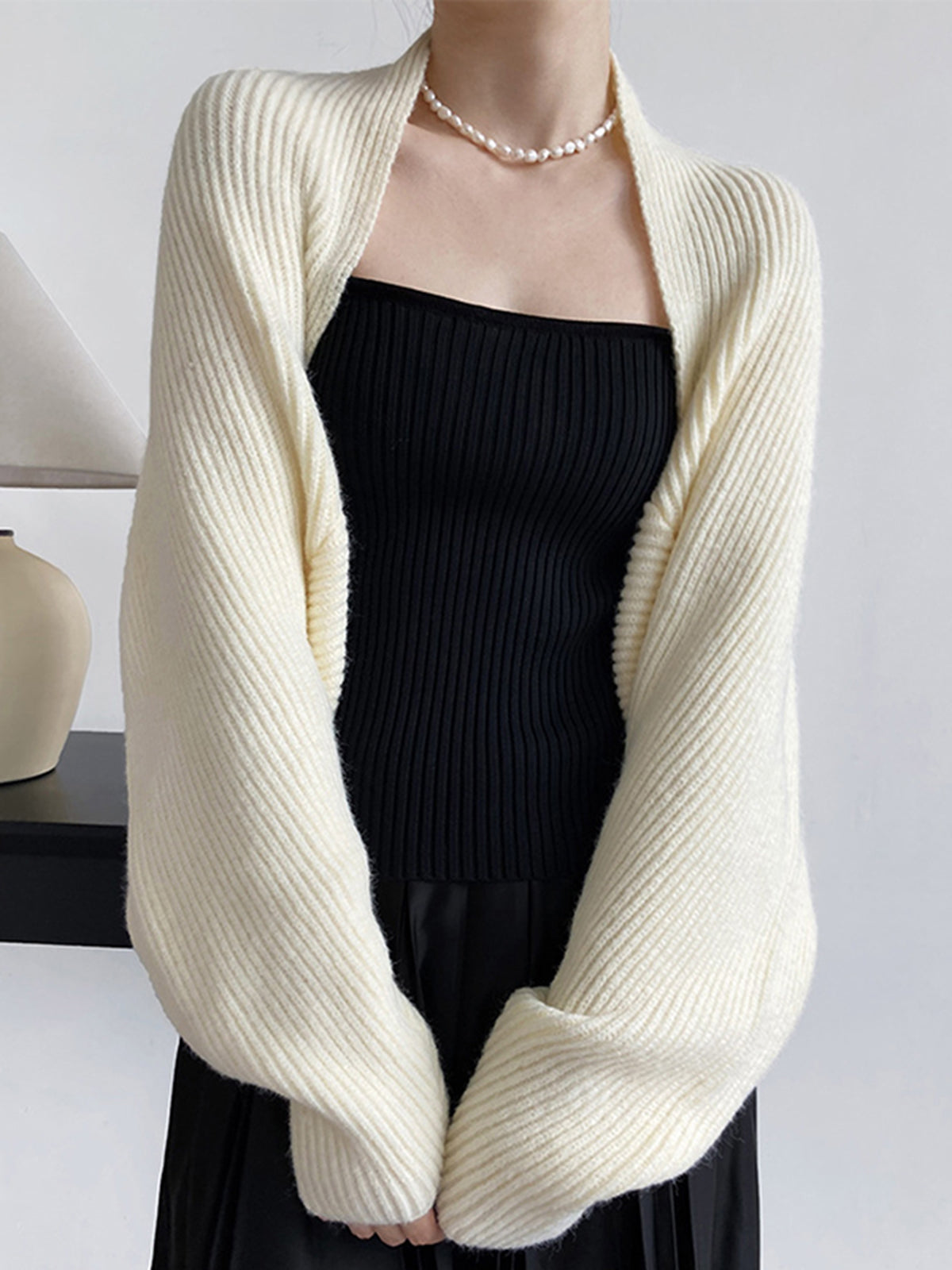 Oversized geribd damesvest met ballonmouwen en sjaalkraag - crème