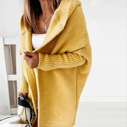 Oversized gebreid damesvest met capuchon en vleermuismouwen - okergeel