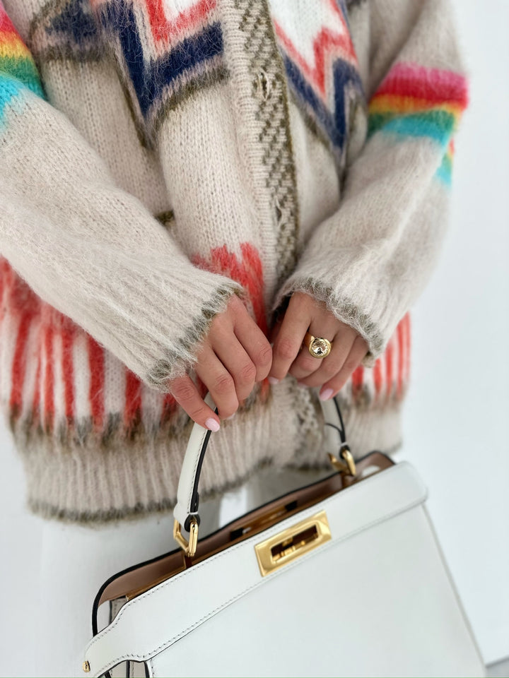 Oversized damesvest met ingebreid sterpatroon, V-hals en opgezette zakken