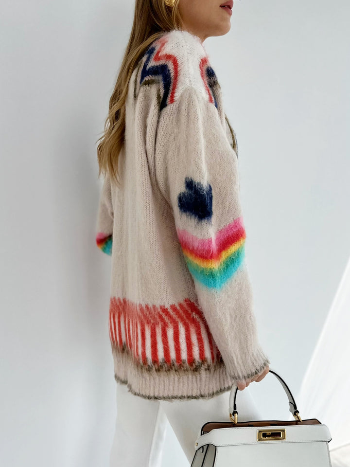 Oversized damesvest met ingebreid sterpatroon, V-hals en opgezette zakken