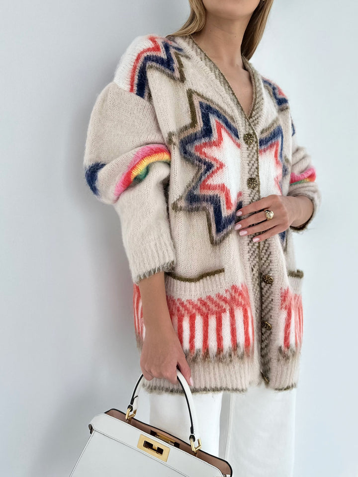 Oversized damesvest met ingebreid sterpatroon, V-hals en opgezette zakken