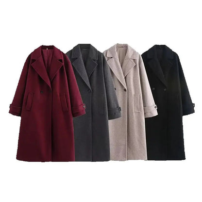 Oversized lange damesjas in wollook met brede revers