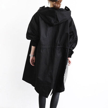 Oversized trenchcoat voor dames met capuchon en knoopsluiting - zwart
