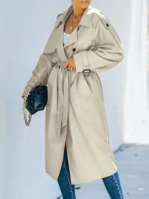 Oversized trenchcoat voor dames met dubbele knopenrij, strikceintuur en schouderstukken - zandbeige