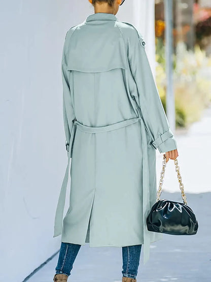 Oversized trenchcoat voor dames met dubbele knopenrij, strikceintuur en schouderstukken