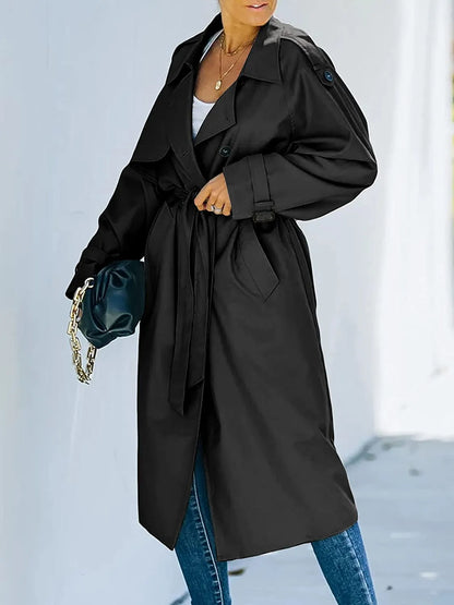Oversized trenchcoat voor dames met dubbele knopenrij, strikceintuur en schouderstukken