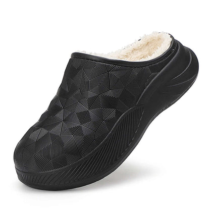 Pantoffels met waterafstotende bovenkant in geometrisch reliëf, teddy voering en dikke zool - zwart