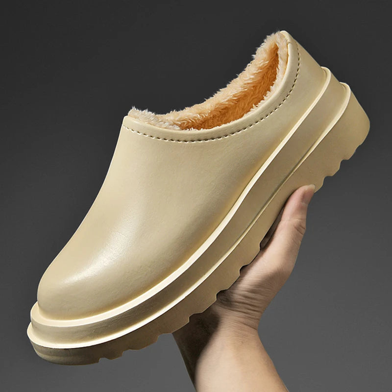 Dichte herenpantoffel met gladde bovenkant in leerlook, pluche voering en dikke profielzool