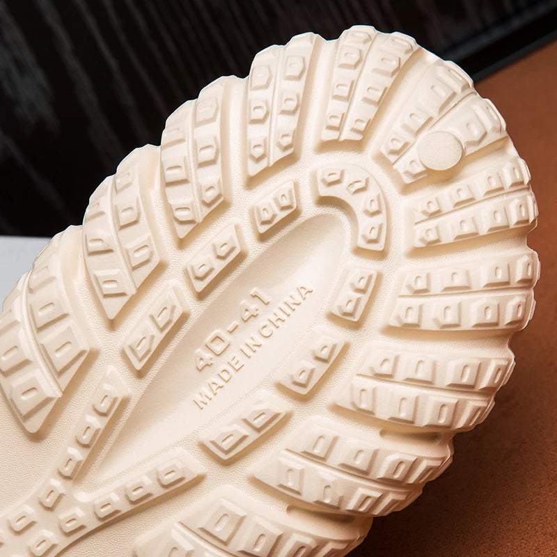 Pantoffels in klompmodel met EVA-buitenkant, fleece voering, dikke zool en draaibare hielband - beeld 4