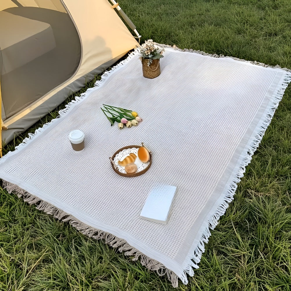 Picknickkleed van 180 x 180 cm met wafelstructuur en franjes op het gras - beeld 4