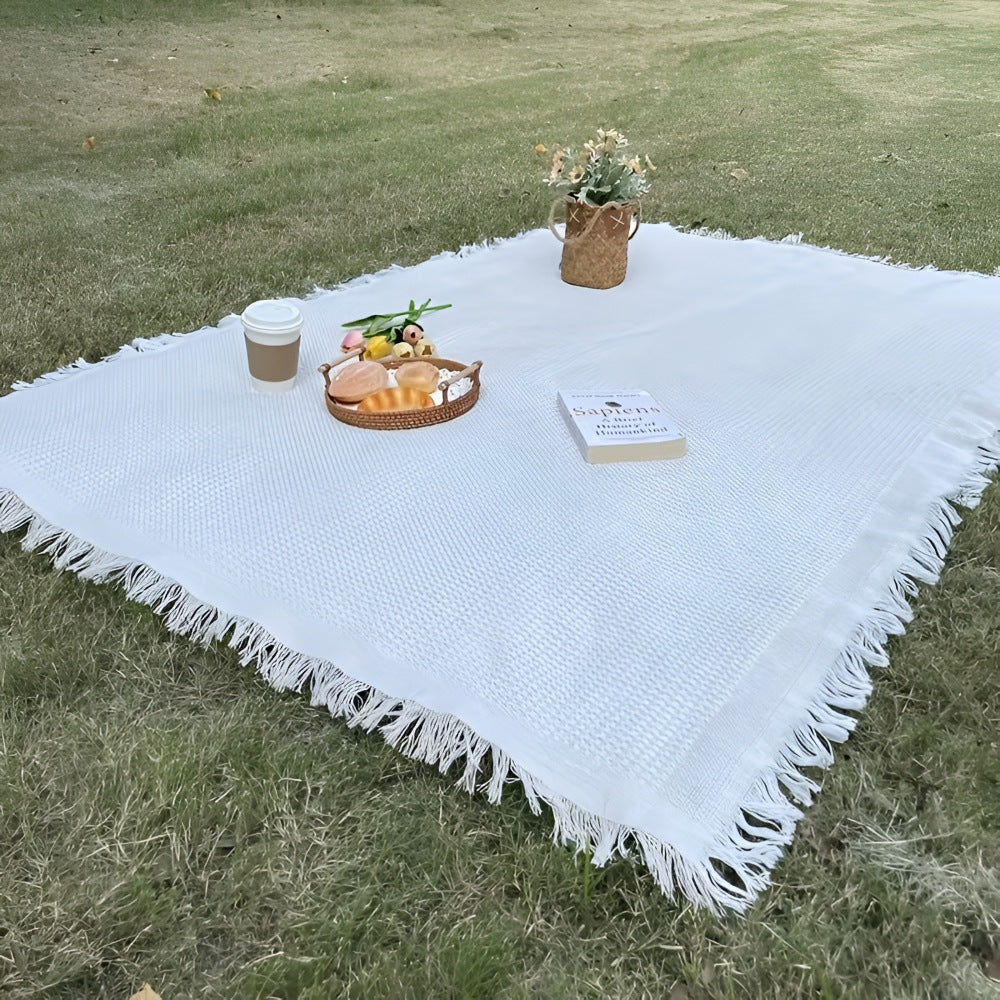 Picknickkleed van 180 x 180 cm met wafelstructuur en franjes op het gras - beeld 6