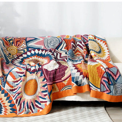 Geweven plaid met kleurrijk zonnenpatroon en oranje rand - 200 x 229 cm