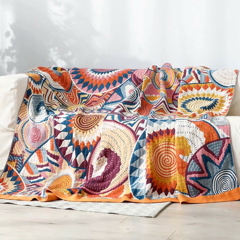 Geweven plaid met kleurrijk zonnenpatroon en oranje rand - 229 x 249 cm