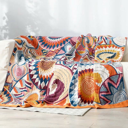 Geweven plaid met kleurrijk zonnenpatroon en oranje rand - 229 x 249 cm