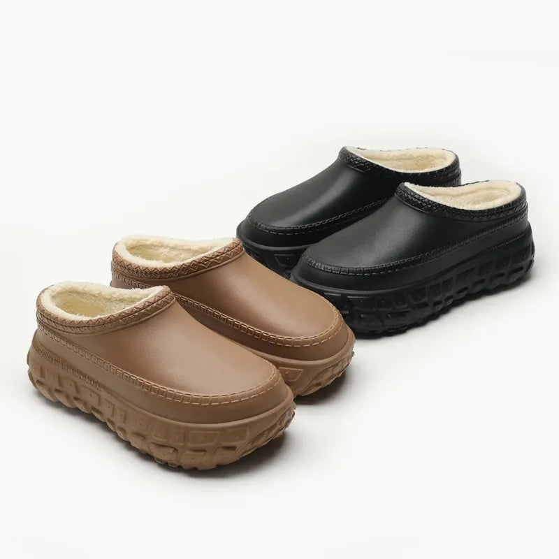 Plateau pantoffels in leerlook met dikke zool met bandenprofiel en pluche voering