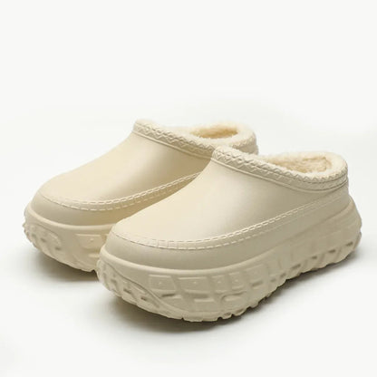 Plateau pantoffels in leerlook met dikke zool met bandenprofiel en pluche voering - beige