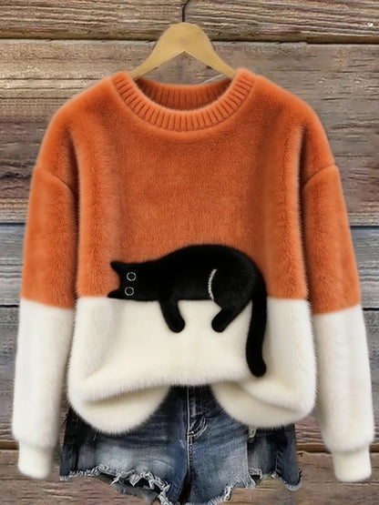 Pluizige damestrui met zwarte kattenprint en crèmewitte onderkant - oranje