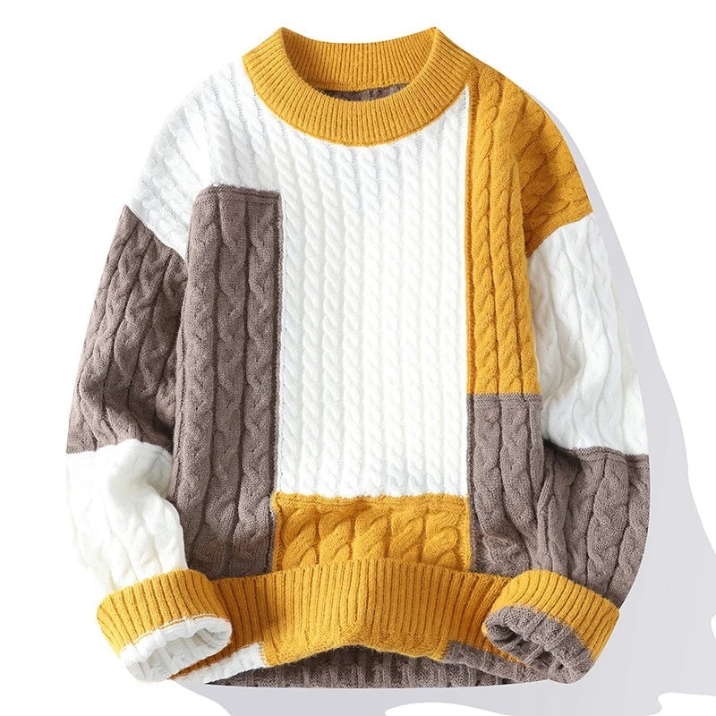 Ruime herentrui met kabelpatroon en patchwork van kleurvlakken - oker/taupe