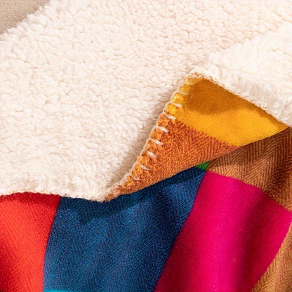 Sherpa plaid met kleurrijk ruitpatroon over een bed - beeld 3