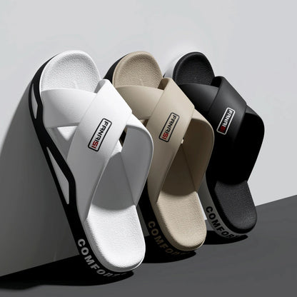 Slippers met gekruiste banden over de wreef, voetbed met structuur en dikke zool