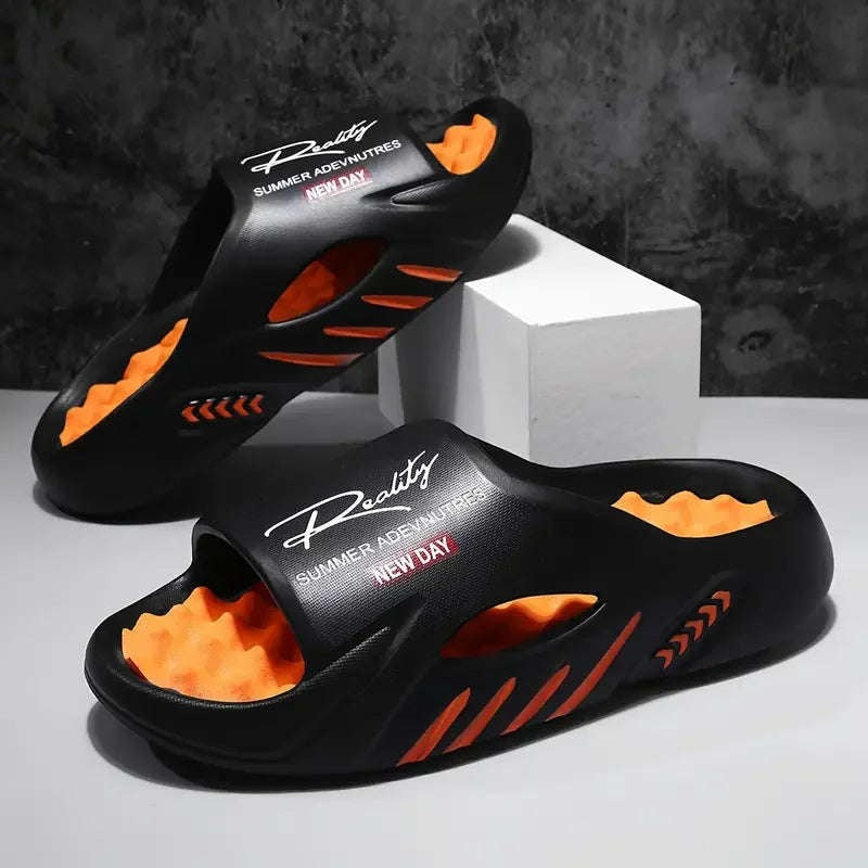 Slippers voor heren van EVA met noppenvoetbed in contrastkleur en uitsparingen in de zijkant - zwart/oranje
