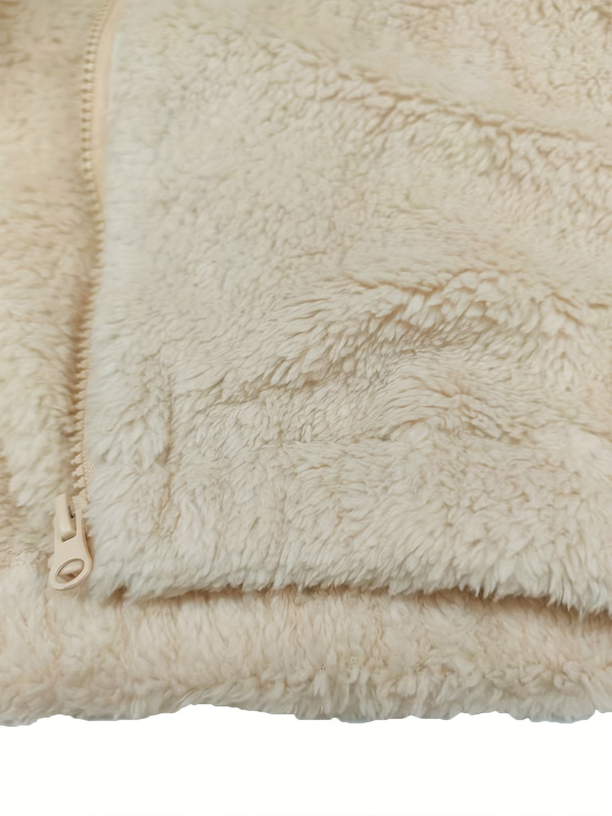 Teddy damesbodywarmer met opstaande kraag, doorlopende rits en steekzakken