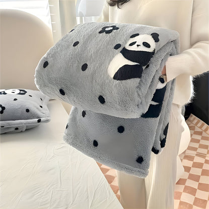 Teddy fleece deken met dambordpatroon, opgevouwen in de armen - grijs met panda's