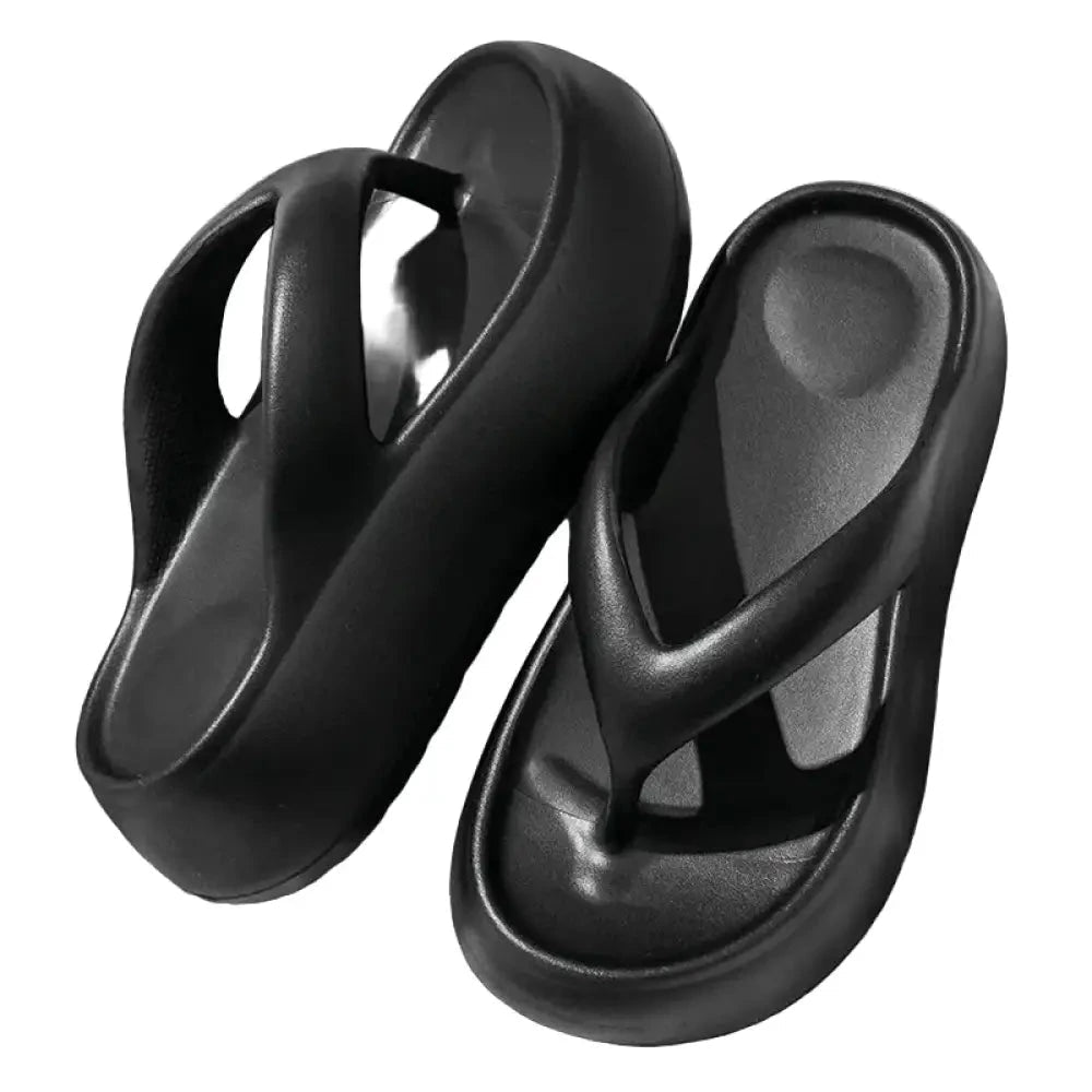 Teenslippers van EVA met hoge zool, brede bandjes en uitgehold voetbed - zwart