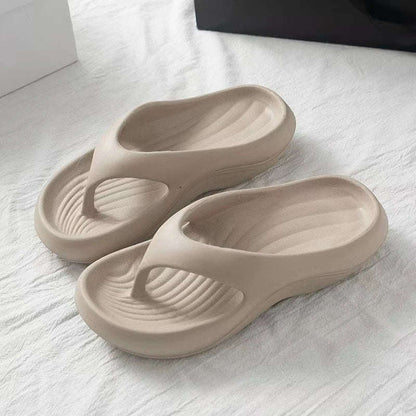Teenslippers van EVA met geribd voetbed en dikke gebogen zool - taupe