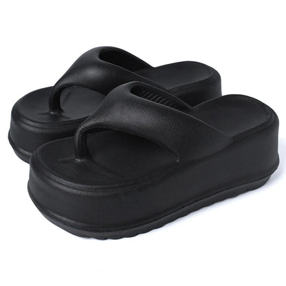 Teenslippers met hoge plateauzool en dikke teenband van EVA - zwart