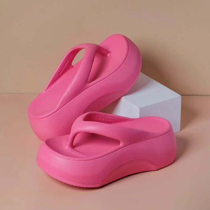 Teenslippers met plateauzool en brede teenband van EVA - fuchsia