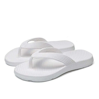 Teenslippers van EVA met dikke zool, geribbelde band en voetbed met schuine ribbels - wit
