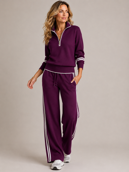 Tweedelige damesset met ritstrui en wijde broek met strepen - aubergine