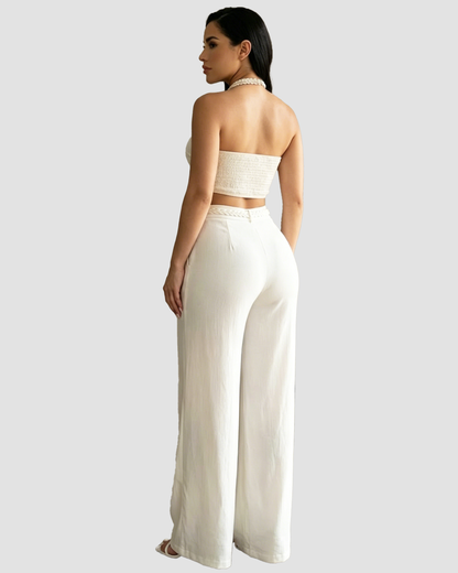 Tweedelige set met gevlochten haltertop en wijde broek met hoge taille