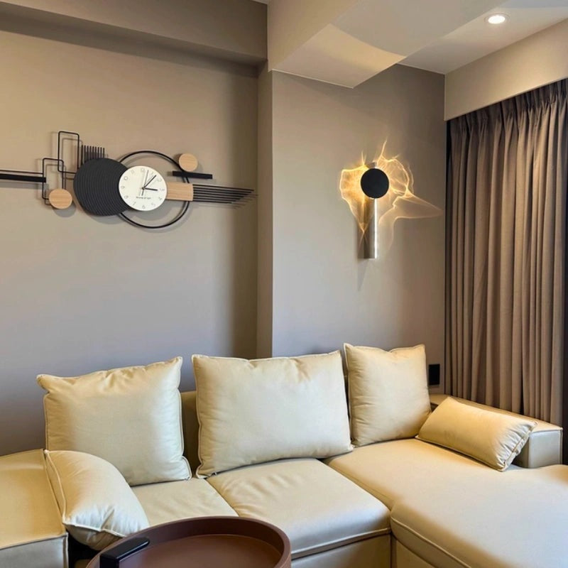 Wandlamp met ronde schijf die een golvend lichtpatroon op de muur werpt - beeld 8