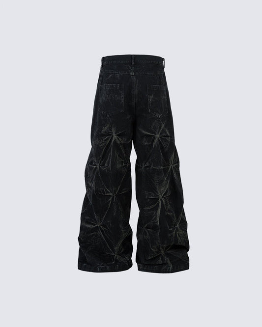 Wijde baggy jeans met geplooide structuur en gewaxte look