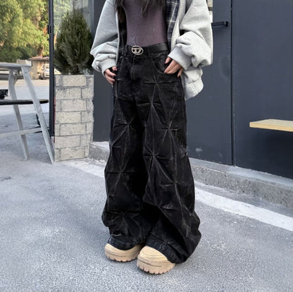 Wijde baggy jeans met geplooide structuur en gewaxte look - beeld 2