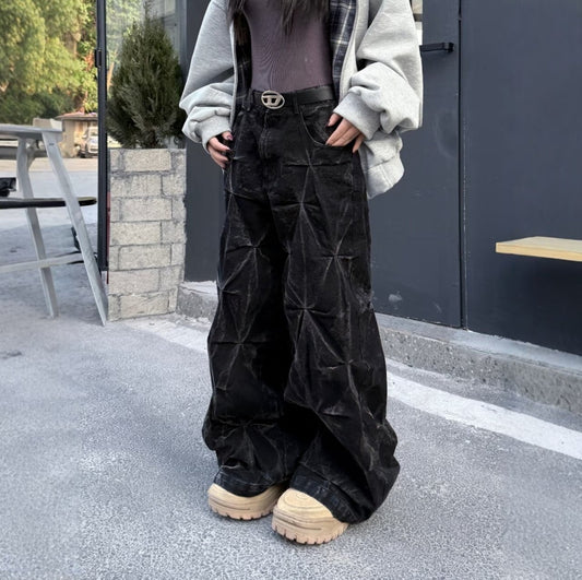 Wijde baggy jeans met geplooide structuur en gewaxte look - beeld 2