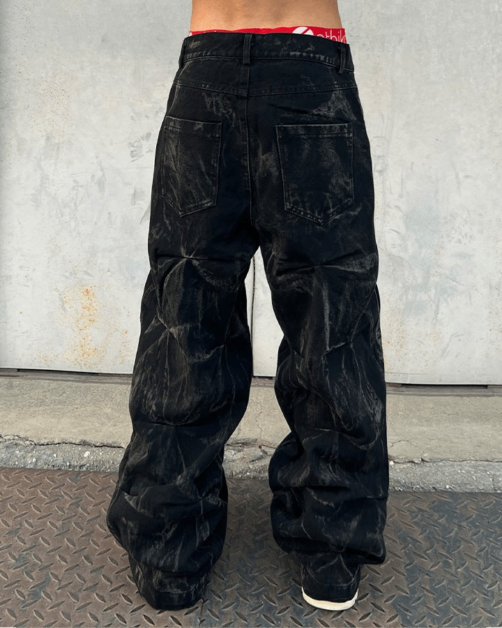 Wijde baggy jeans met geplooide structuur en gewaxte look - beeld 6