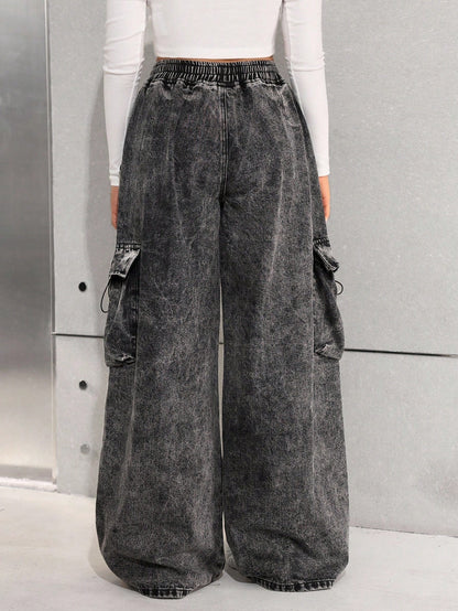 Wijde cargo jeans voor meisjes van stonewashed denim met trekkoord en grote zakken op de pijpen - zwart stonewashed