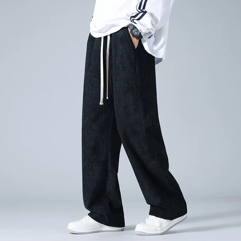Wijde ribfluwelen broek voor heren met gemêleerde look en trekkoord in de taille - zwart