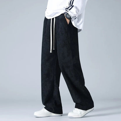 Wijde ribfluwelen broek voor heren met gemêleerde look en trekkoord in de taille - zwart