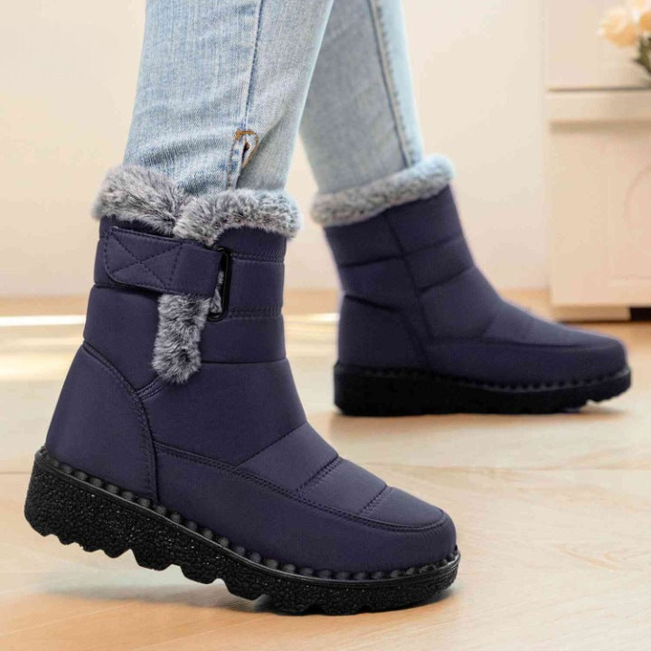 Gewatteerde winterlaarsjes voor dames met bontrand en klittenband - donkerblauw