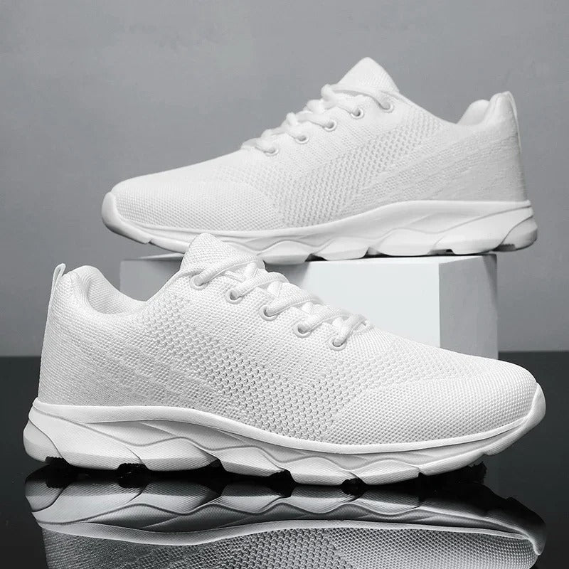 Herensneakers van mesh met lichte schokdempende zool en veters