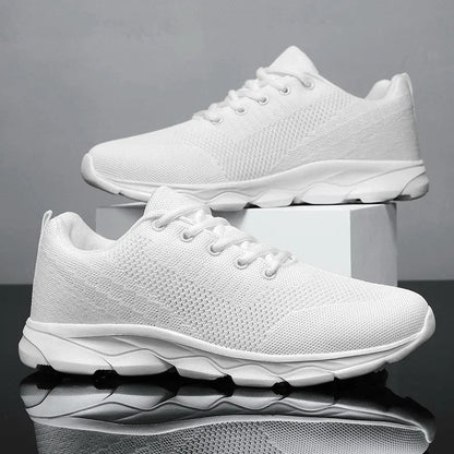 Herensneakers van mesh met lichte schokdempende zool en veters