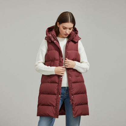 Lange mouwloze damesbodywarmer met gewatteerde capuchon en rits
