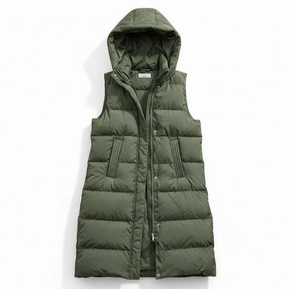 Lange mouwloze damesbodywarmer met gewatteerde capuchon en rits