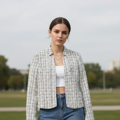 Kraagloos tweed damesjack met rafelrand, open gedragen