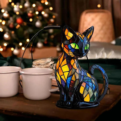 Zwarte kattenlamp in glas-in-loodlook met groene ogen en vlakjes in blauw, oranje en geel